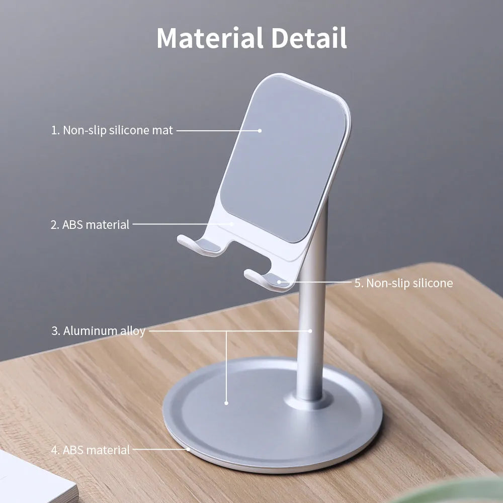 Silver white aluminium alloy mobile phone stand holding a smartphone on a desk