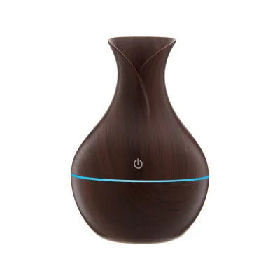 Vase humidifier 130ml 5V 3W in crackle mahogany or wood grain finish on a desk