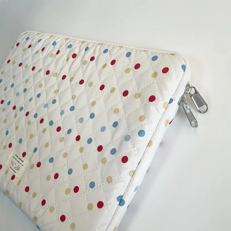 Women's polka dot laptop bag in solid colour with size options for 11, 13, and 15.6 inch computers.
