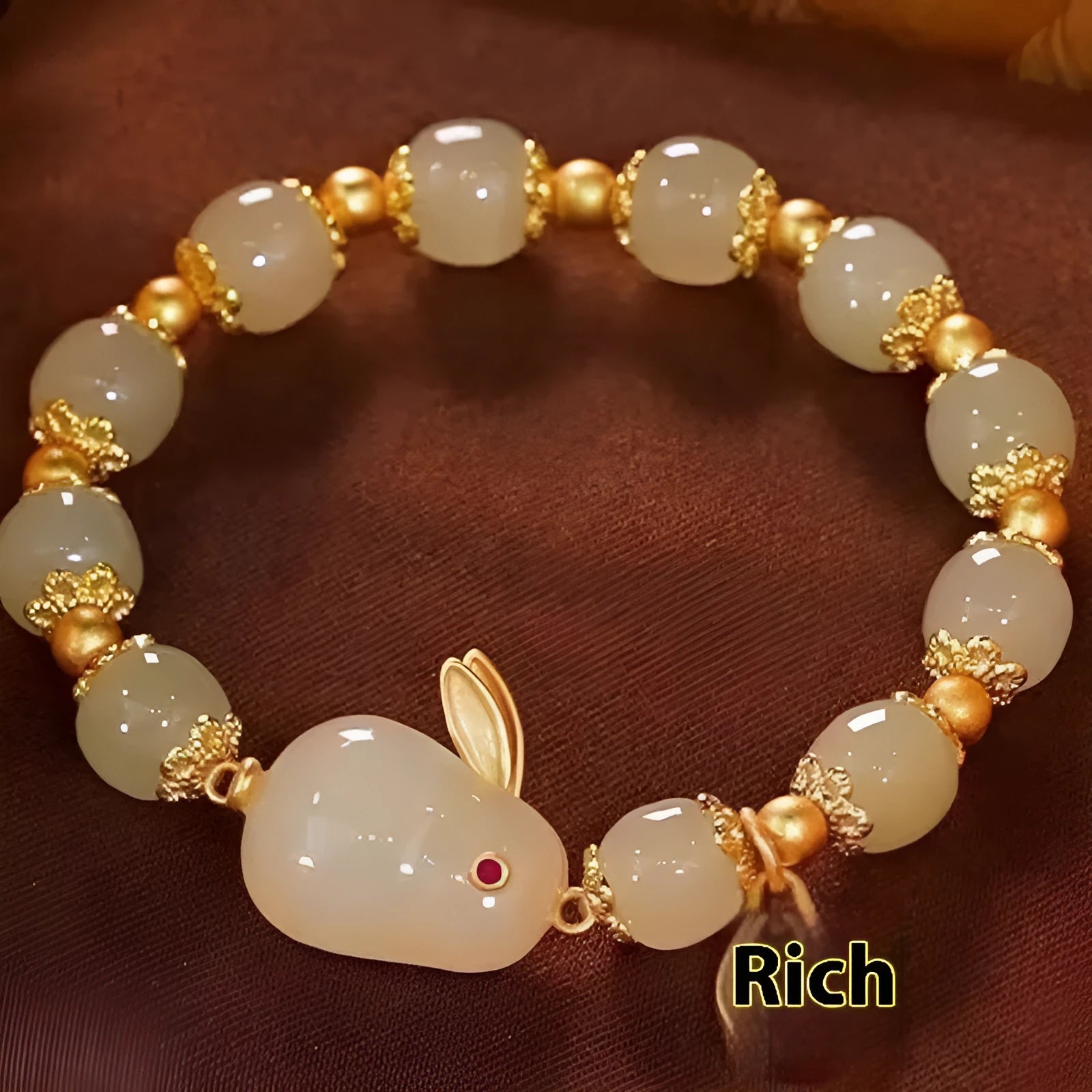 Green jade hare bracelet for women with Chinese style zodiac animal design and lily decorations