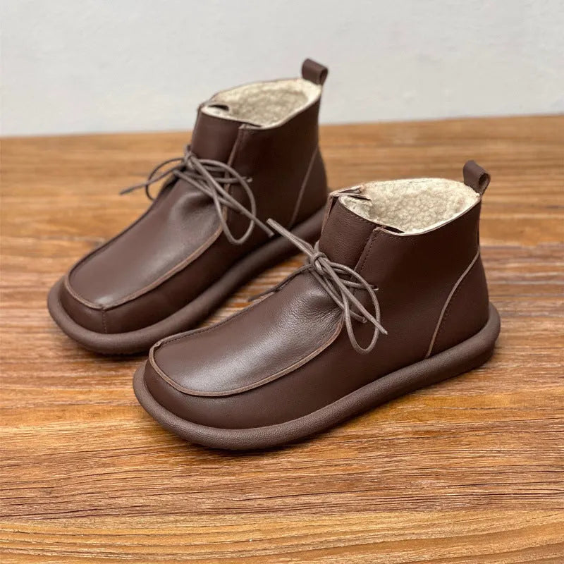 Women's cowhide boots with optional velvet lining, flat heel, round toe, and 9cm ankle sock in black and coffee colours
