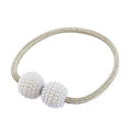 Magnetic curtain tiebacks with pearl beads in multiple colour options on white background