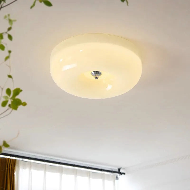 Cream coloured American antique style bedroom ceiling lamp with a three-colour light.