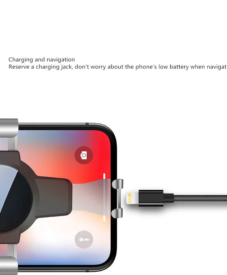 Black S4 gravity mirror ABS mobile phone bracket mounted on a car air conditioning vent