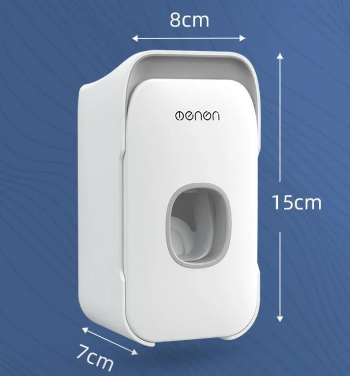 Automatic toothpaste dispenser mounted on bathroom wall in blue colour with touchless sensor