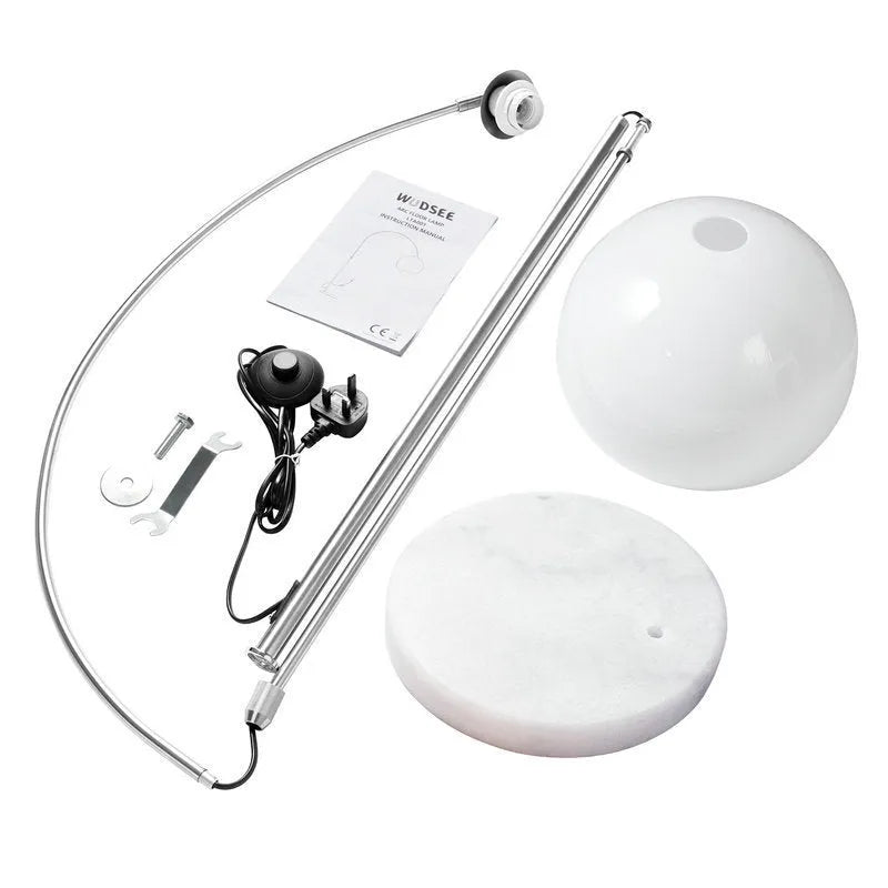 Modern minimalist fishing floor lamp with white acrylic shade on marble base with polished stainless steel pole