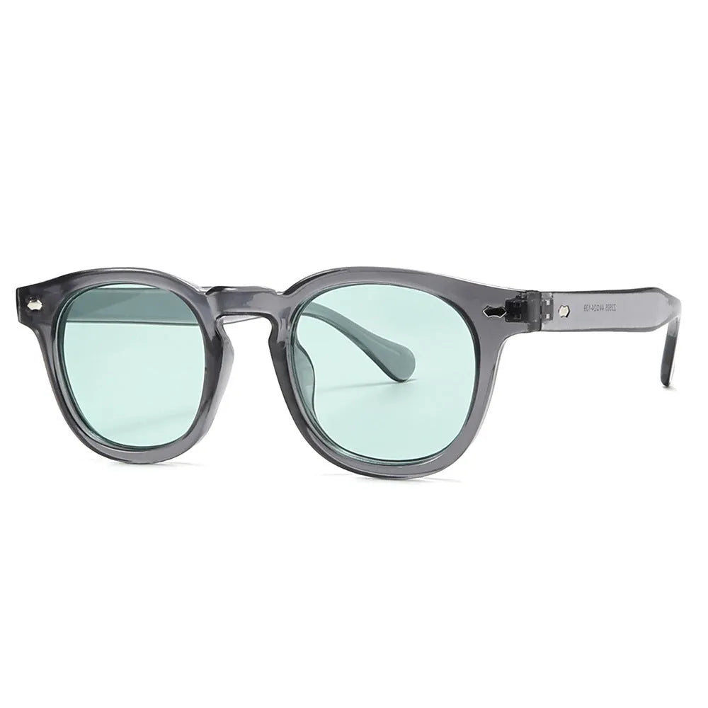 Simple round rim retro sunglasses with plastic frame on a solid background.