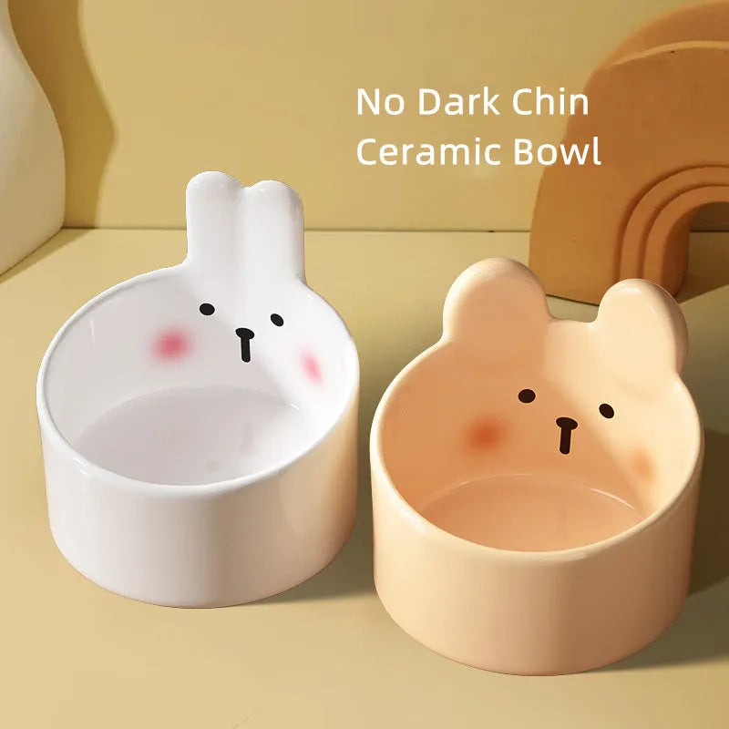 Ceramic pet feeding bowls with neck protection design in white rabbit and brown bear patterns