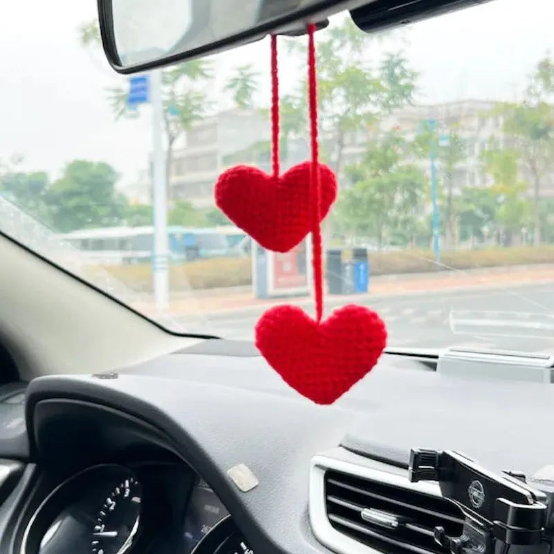 Green and white knitted wool plant ornament for car dashboard with hanging cord