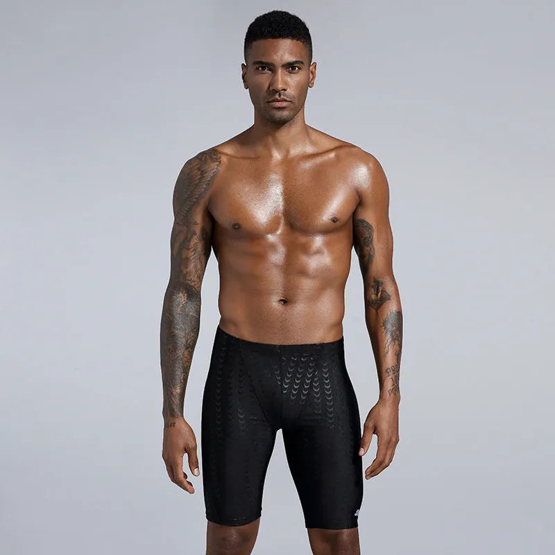 Men's solid colour polyester swimming trunks for beach surfing and swimming, shown in larger sizes.