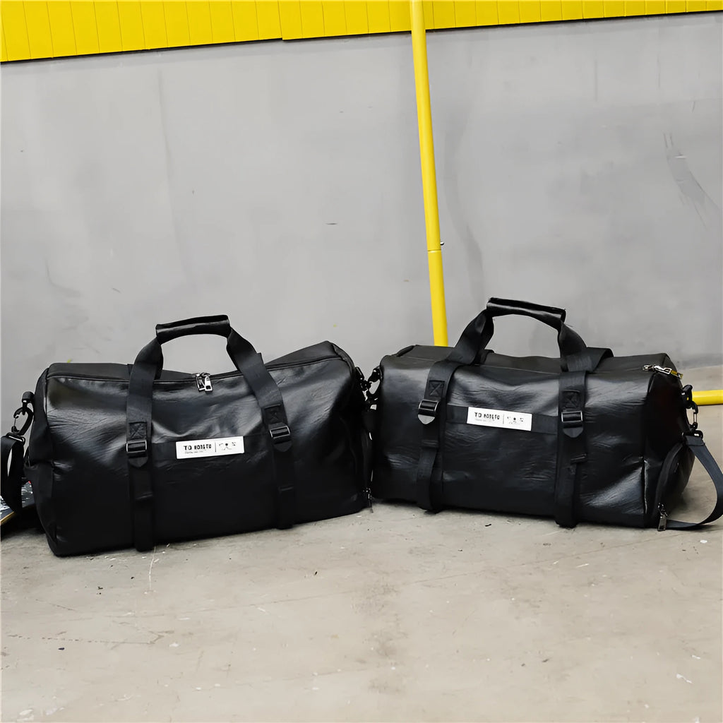 Black fabric portable travel bag shown in large 49cm and small 45cm sizes