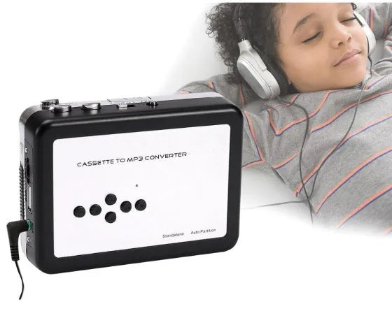 Limited Edition white USB Cassette to MP3 Converter with earphone and USB cable on tabletop