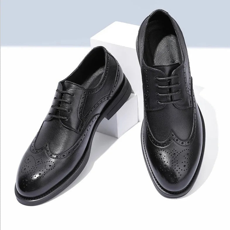 Men's black and brown brogue business shoes with traditional perforated detailing on PU leather upper