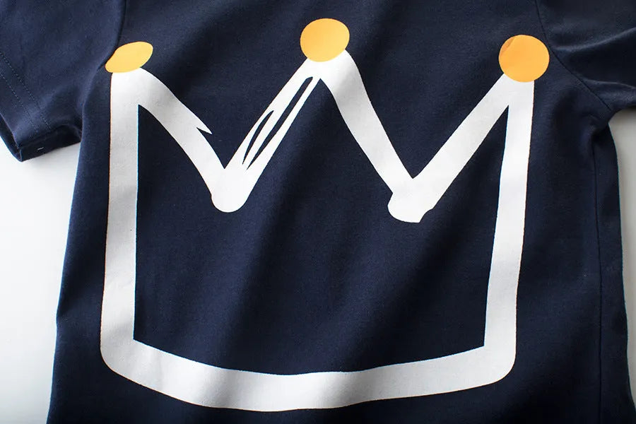 Boys' royal blue short sleeve cotton T-shirt on a hanger with a size chart visible.
