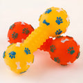 Pet dumbbell sound toy in red, a squeaky PVC dog chew for training and play, 10cm size.