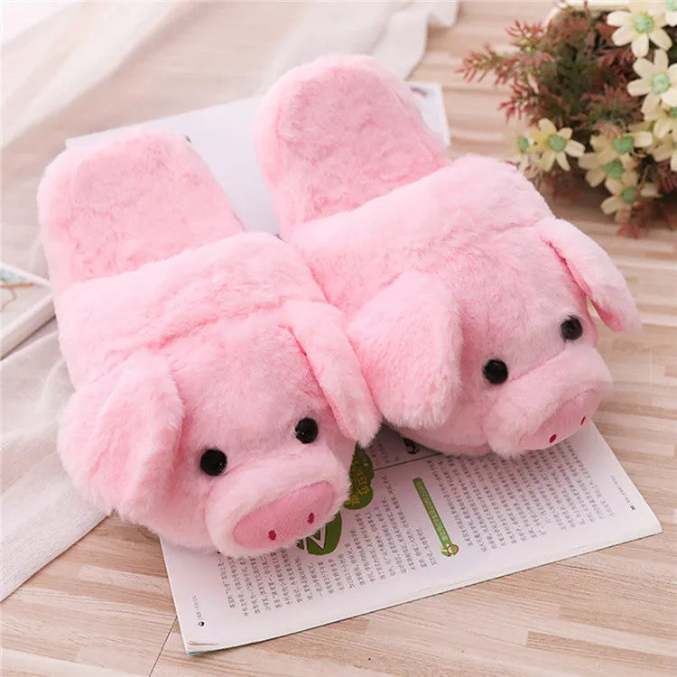 Pink pig-shaped floor slippers made of short plush material.