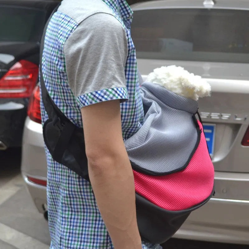 Polyester pet backpack carrier in blue colour showing structured design with ventilation and carrying straps