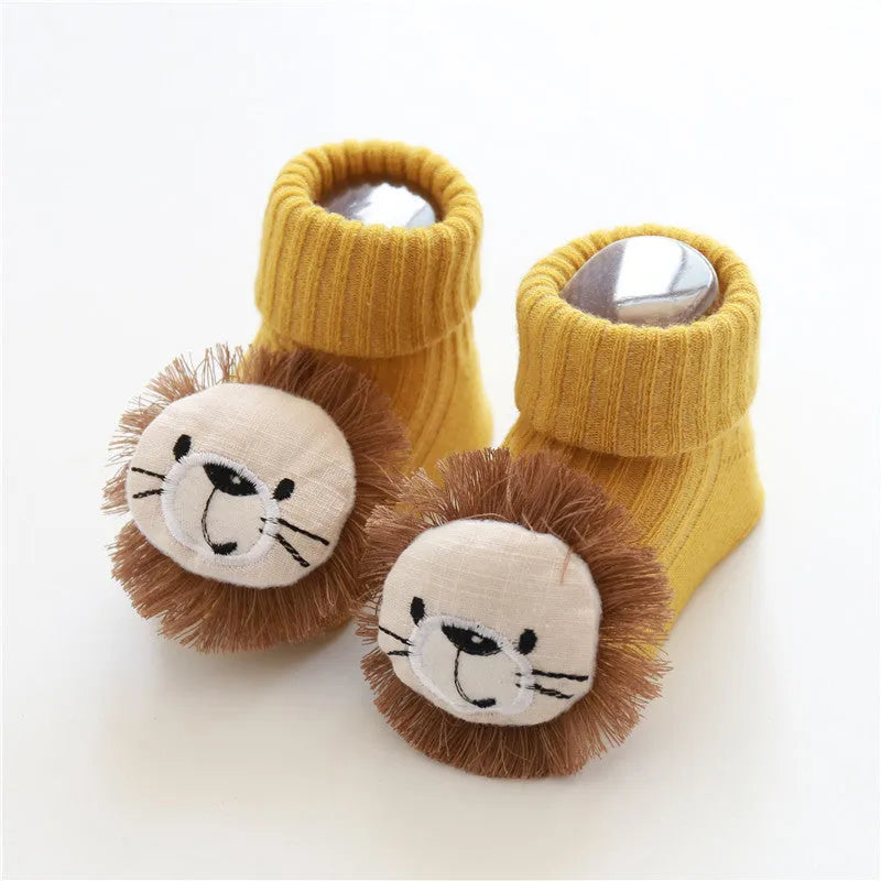 Cotton baby socks with non-slip soles in multiple designs including bows, stars, and animal prints.