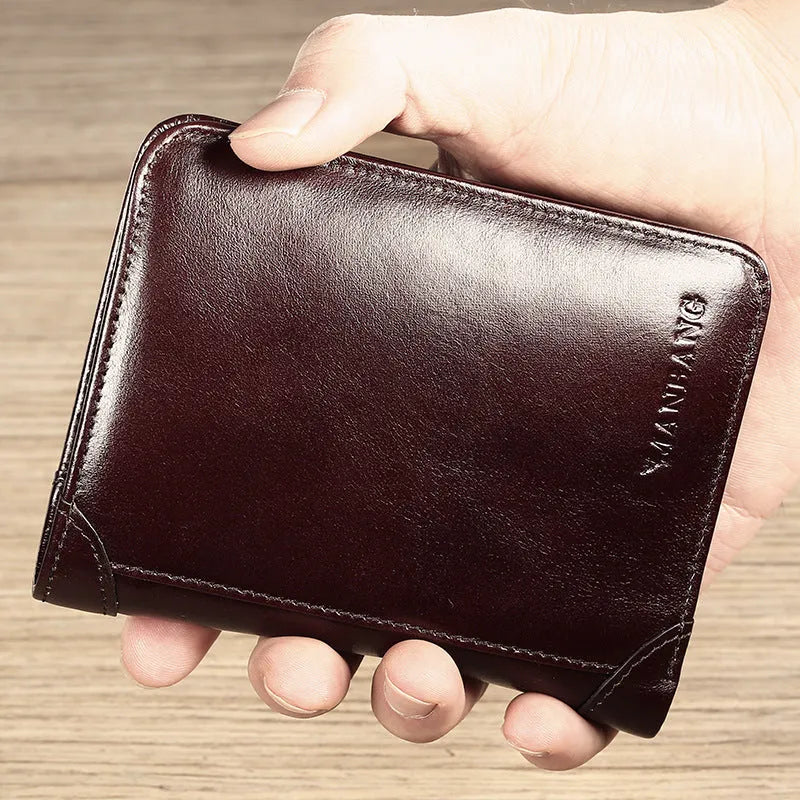 Men's brown leather bifold wallet open to show multiple card slots, a cash compartment, and a coin pocket.