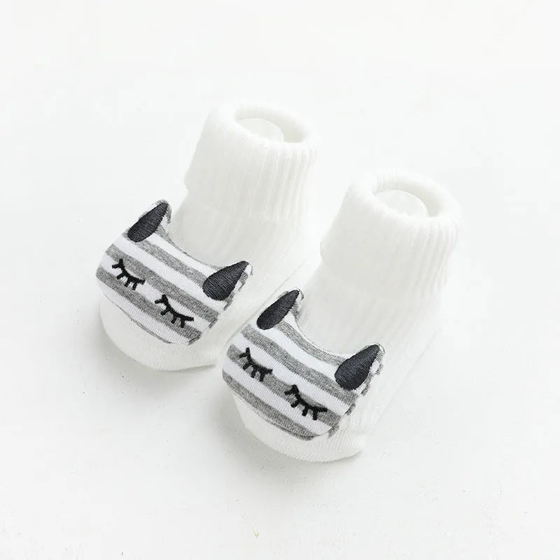 Children's combed cotton non-slip socks in multiple colours for sizes XS, S, and M.