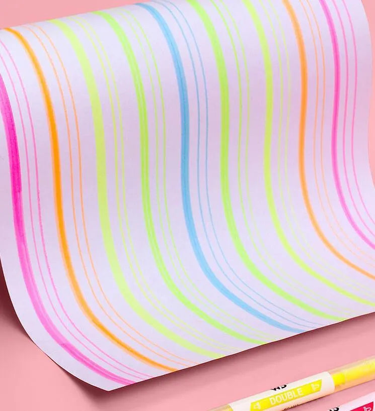 Six double-headed highlighter pens showing round and oblique tips in orange, purple, yellow, green, blue and pink colours