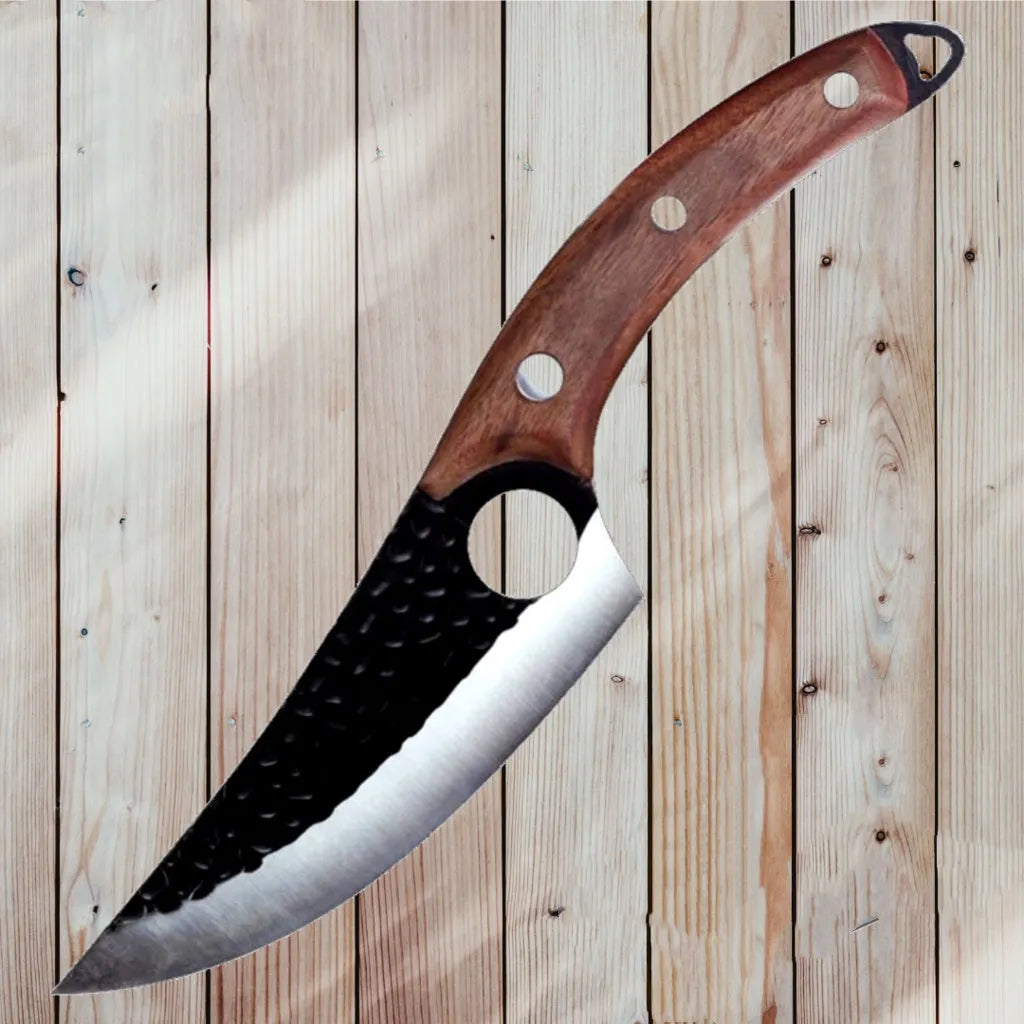 Forged boning knife set with curved scimitar blade and leather sheath on a dark surface.