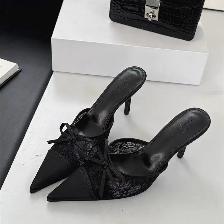 Women's lace-inspired pointed toe high heels with a bowknot detail on the mesh upper.