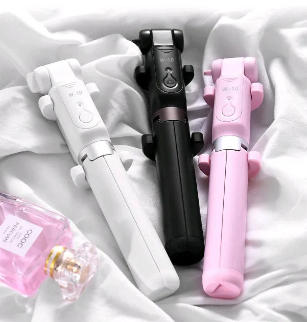 Aluminium alloy Bluetooth selfie stick with tripod and remote control for mobile phones.