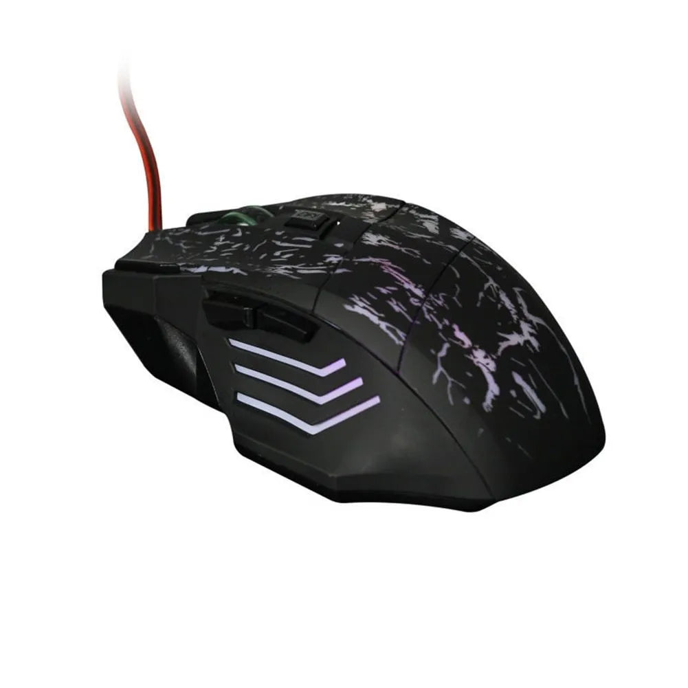 Black wired optical gaming mouse with transparent shell and luminous glow on a desk