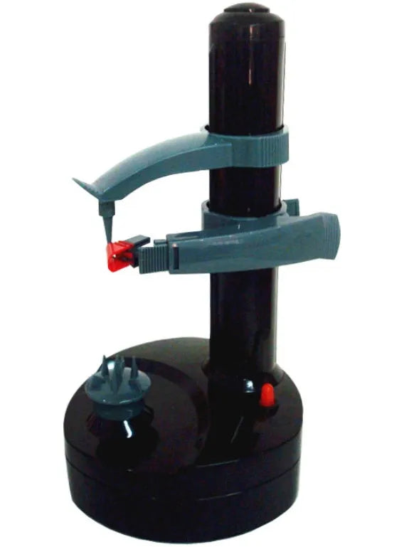 White electric kitchen peeler machine with stainless steel blade on a countertop.
