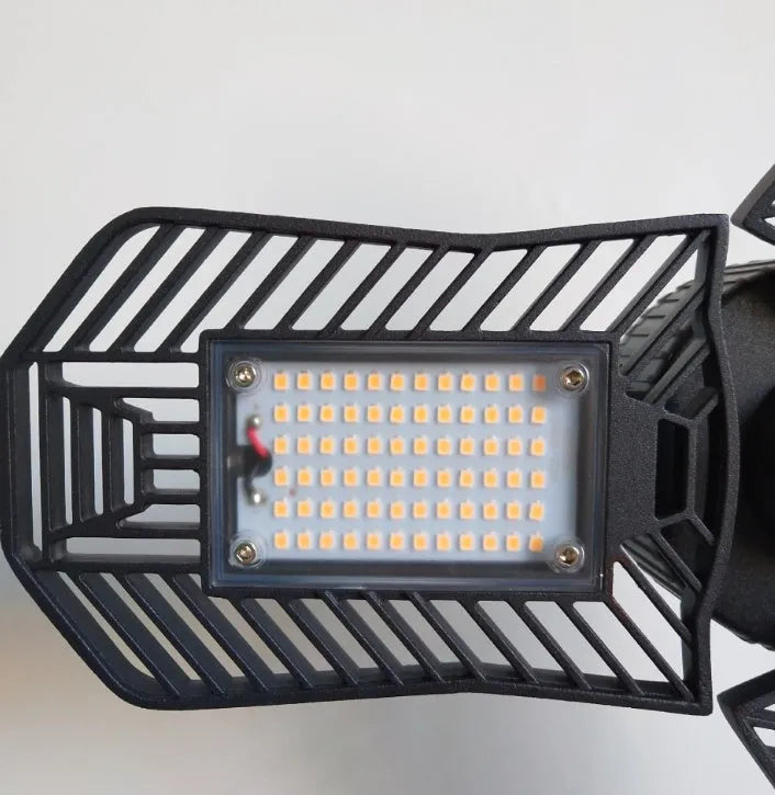 Waterproof industrial foldable garage lamp with die-cast aluminium housing and clear plastic lens