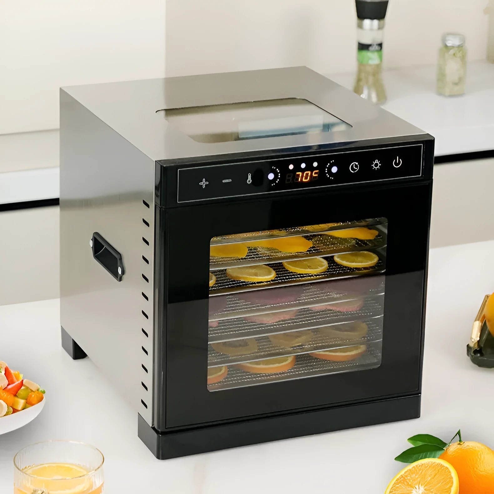Stainless steel fruit dehydrator with multiple trays and LED control panel.