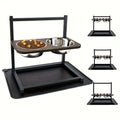 Black iron dog bowl stand with adjustable slots for large breed feeding.