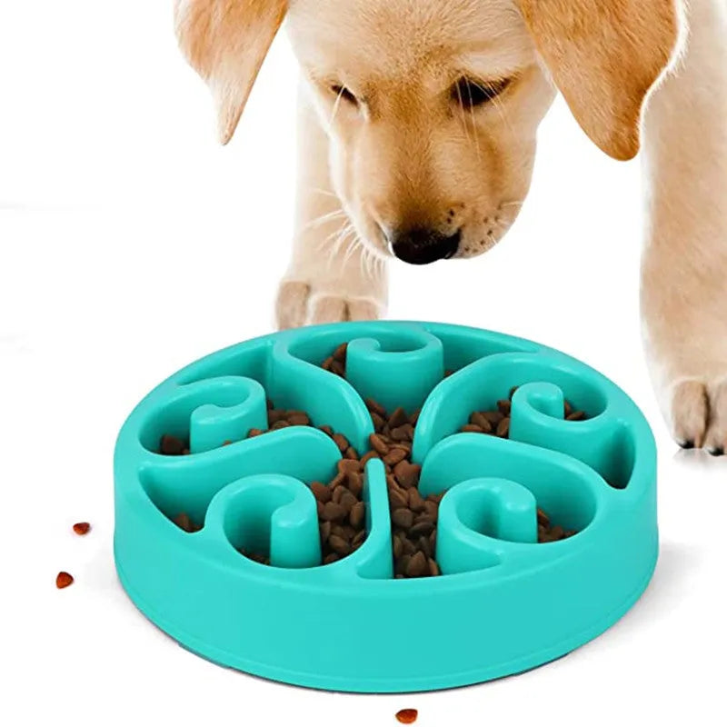 A slow feeder dog bowl with a maze pattern inside and a non-slip base, shown in blue.