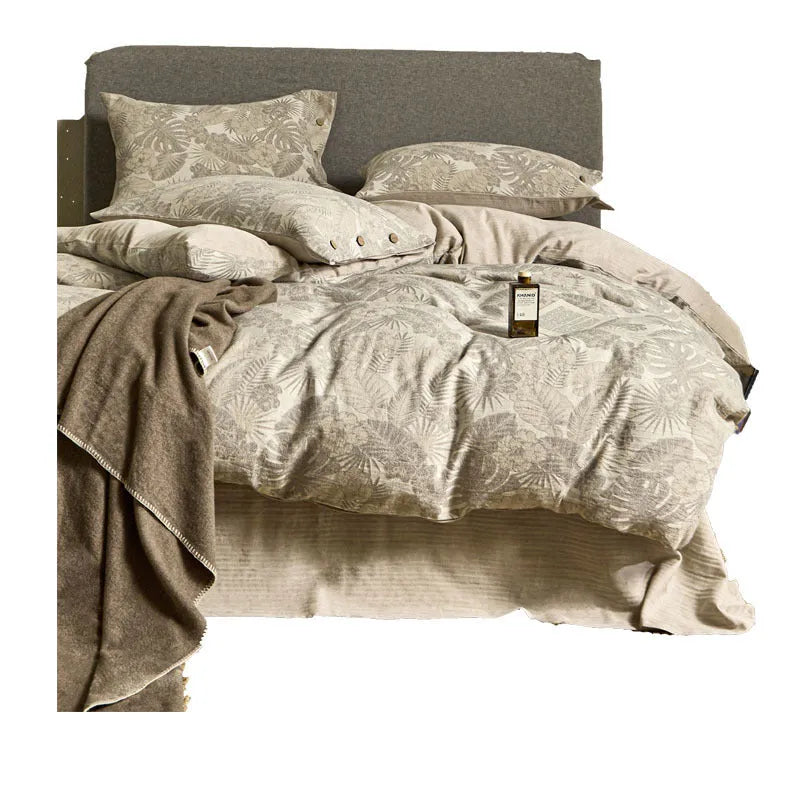 Linen cotton bedding four-piece set with jacquard plant pattern on a 1.5m double bed in Jinlan Gray colourway