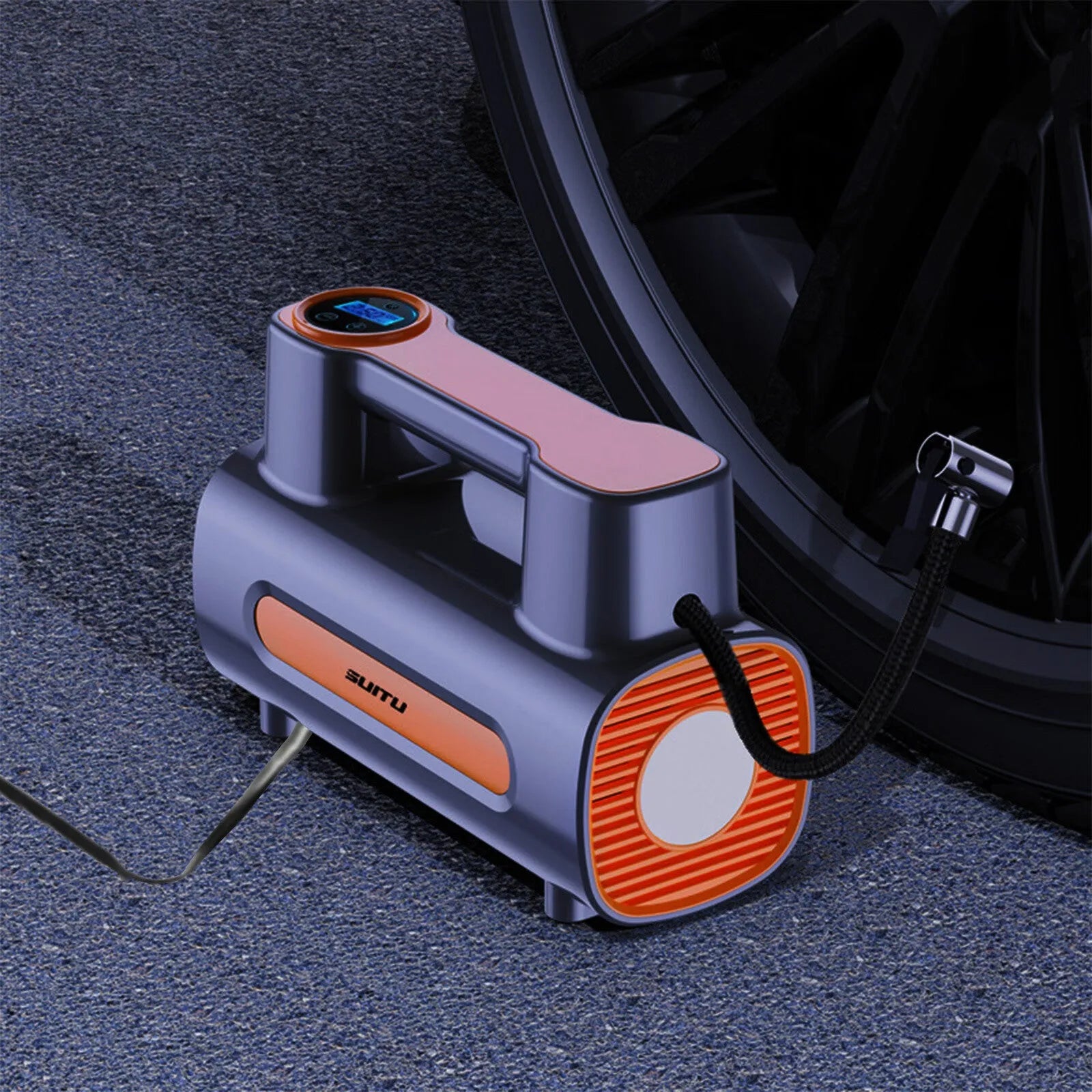 Cordless portable tyre inflator with digital display showing pressure reading