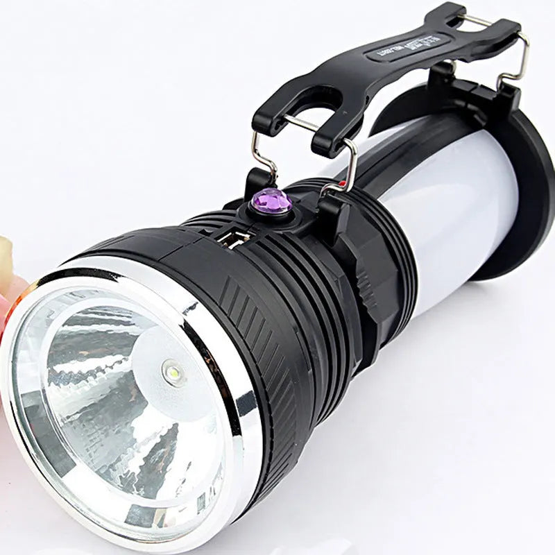 Black solar-powered emergency LED flashlight with USB charging port