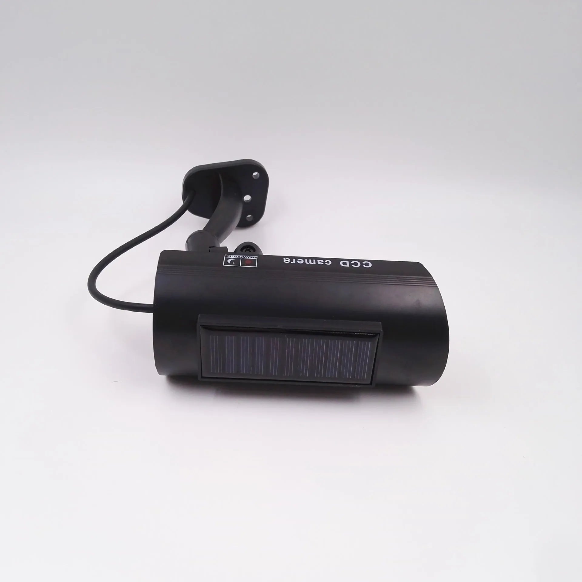 Black gun-style fake surveillance camera with solar simulation flashing light for security deterrent