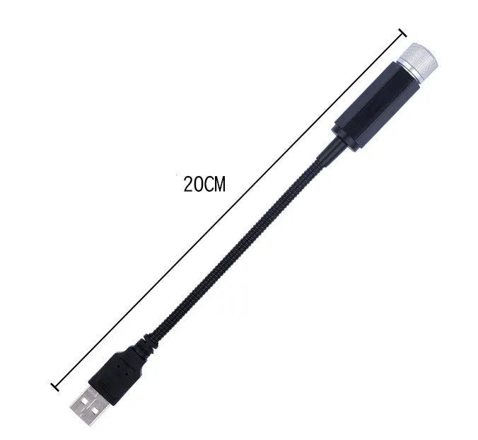 Car roof star light with aluminium housing and USB hose connection showing purple starry sky illumination