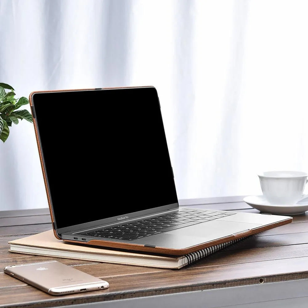Ultra-thin leather sleeve for Apple MacBook with cross pattern, fits Pro and Air models, black colour option.