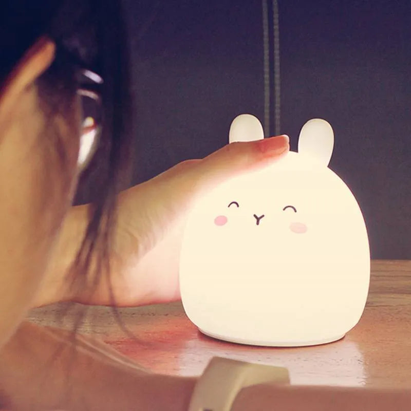 Cute rabbit-shaped silicone night light with LED illumination and USB charging port