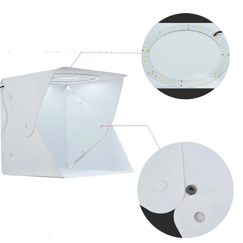 40cm folding photography light box with LED ring light and multiple coloured background cloths setup for product shooting.