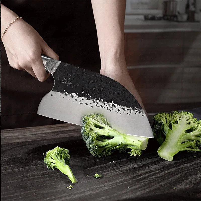Stainless steel kitchen knife with ebony wood handle for cutting meat and bones.