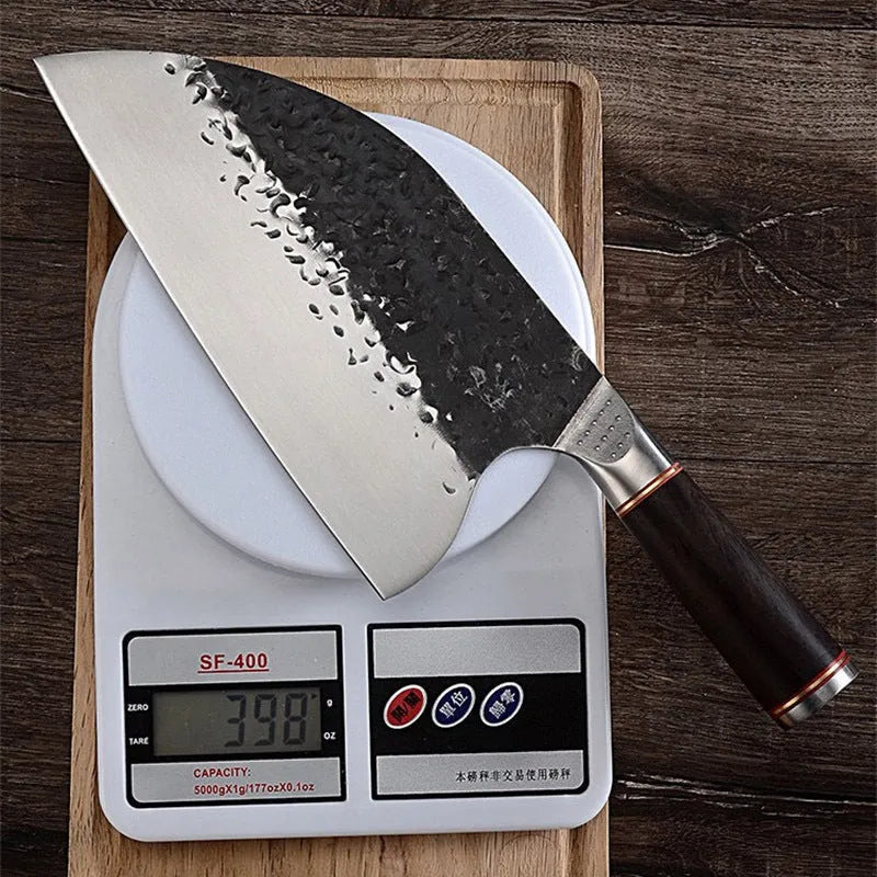 Stainless steel kitchen knife with ebony wood handle for cutting meat and bones.