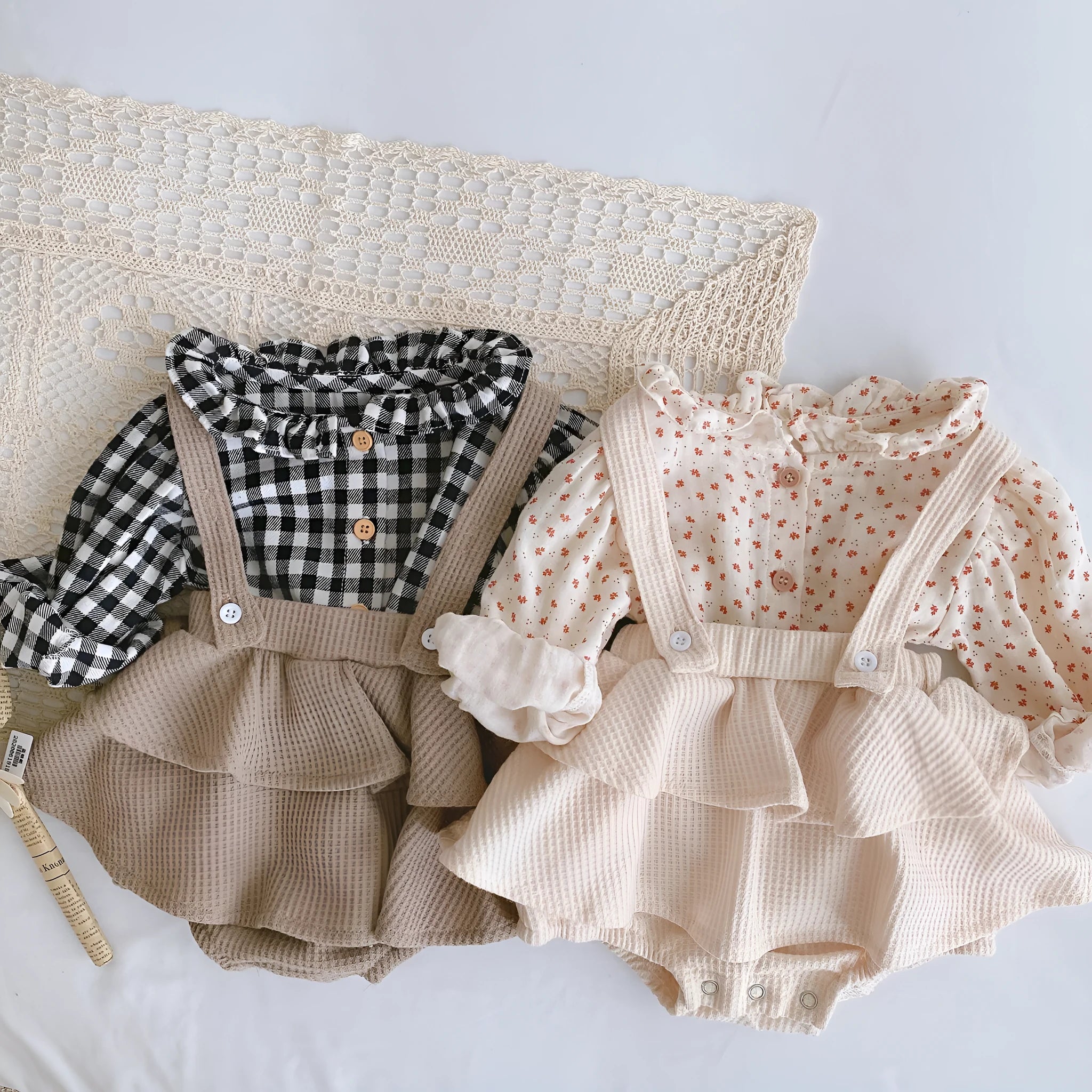 Apricot coloured baby romper with pleated lotus leaf design and sling climbing suit style for 0-2 year olds.