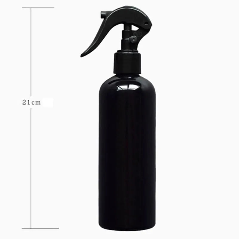 Black plastic and metal succulent gardening tool set with 15 pieces including watering bottle on 75cm square cushion
