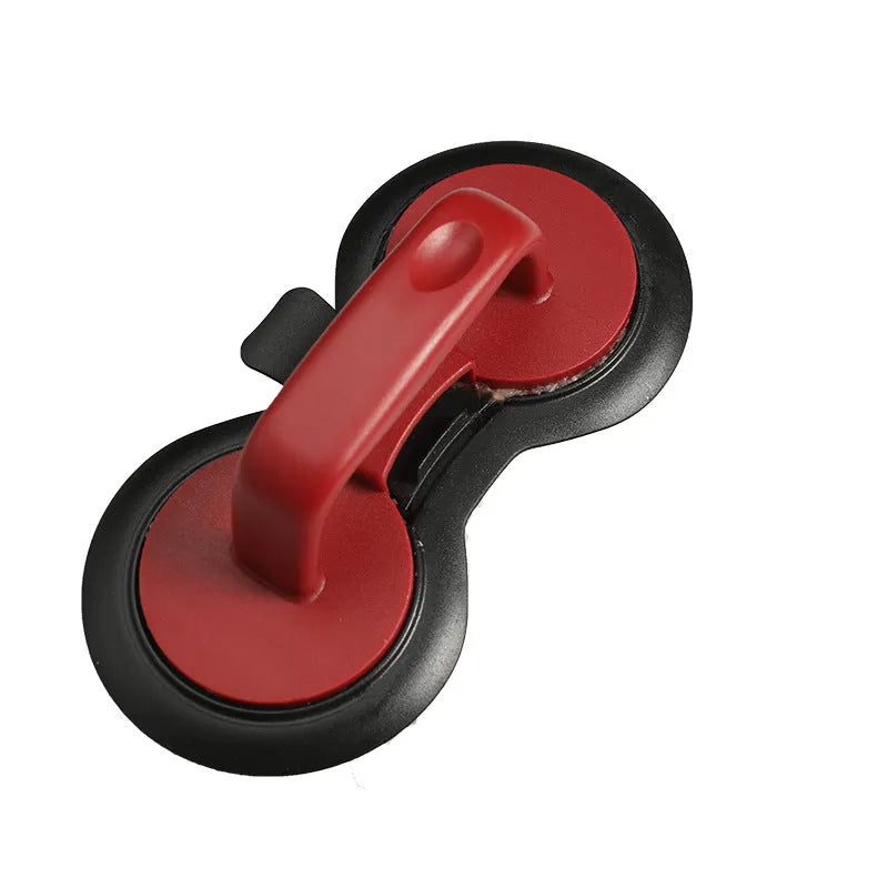 Black and red burger press gadget with non-stick moulds for making patties up to 3/4 pounds.