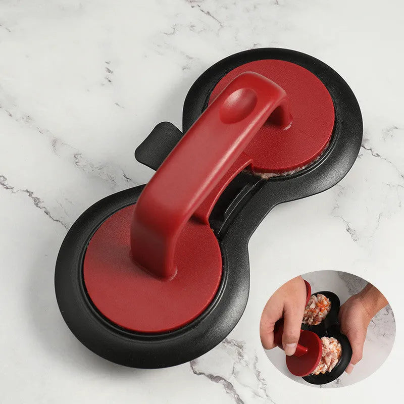 Black and red burger press gadget with non-stick moulds for making patties up to 3/4 pounds.