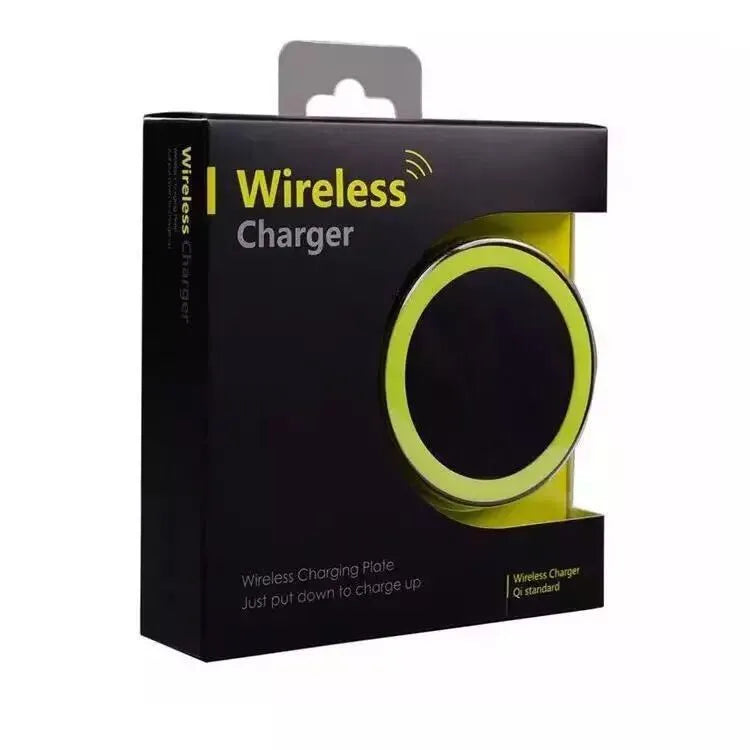Square Qi wireless phone charger base in six colour options on a wooden desk.