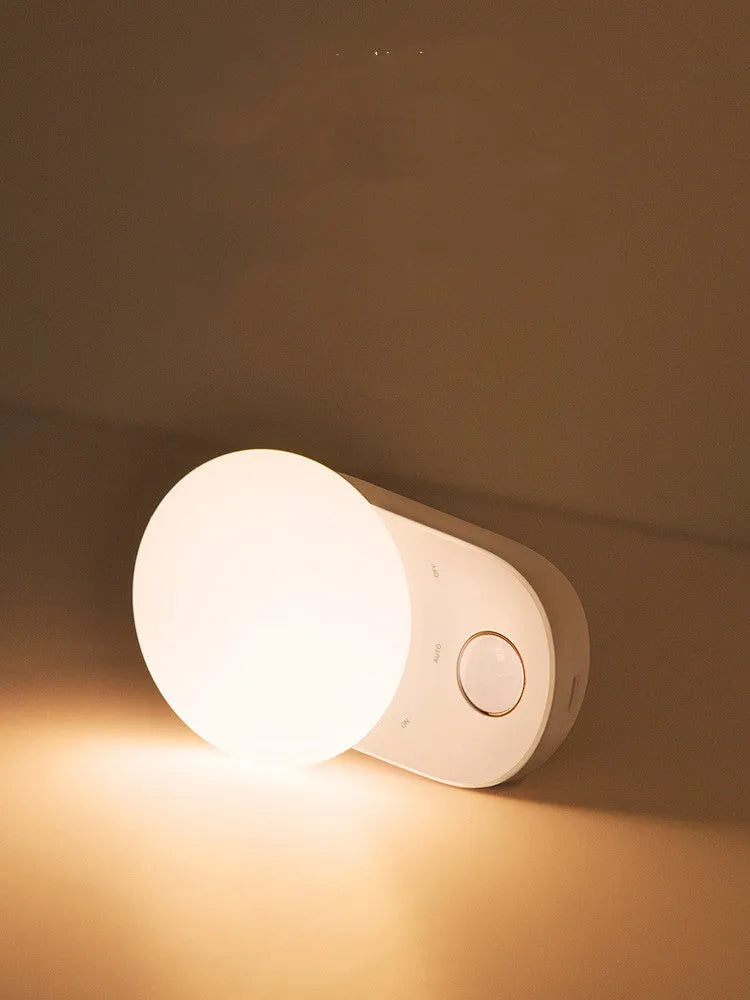 White Baseus Sunshine Series Full Moon rechargeable sensor bedside night light.